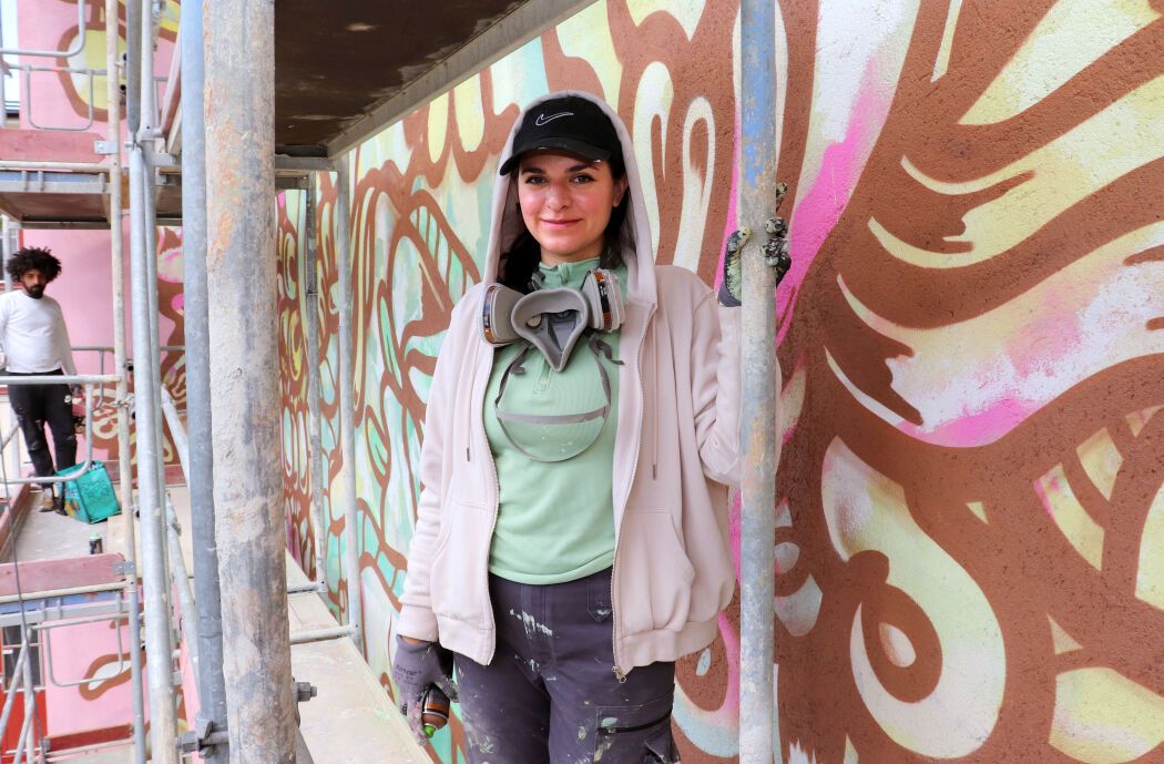 Portrait of the urban artist and muralist Amara Por Dios