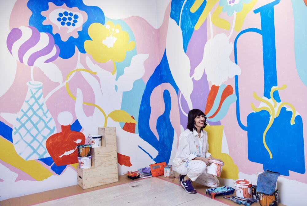 Huge colorful mural painting by the illustrator Erica Jacobson