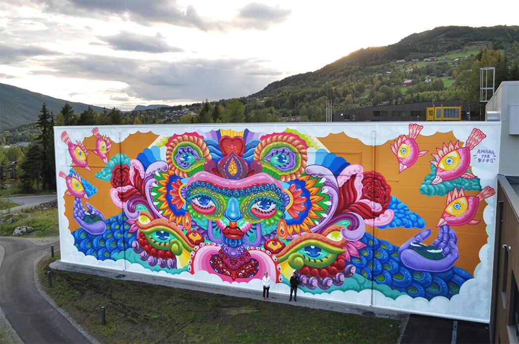 Handpainted mural by the artist Amara Por Dios